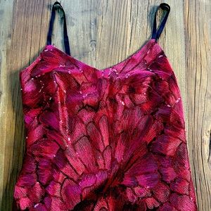 Perfect red and sparkly holiday top from White House Black Market. Size XS.